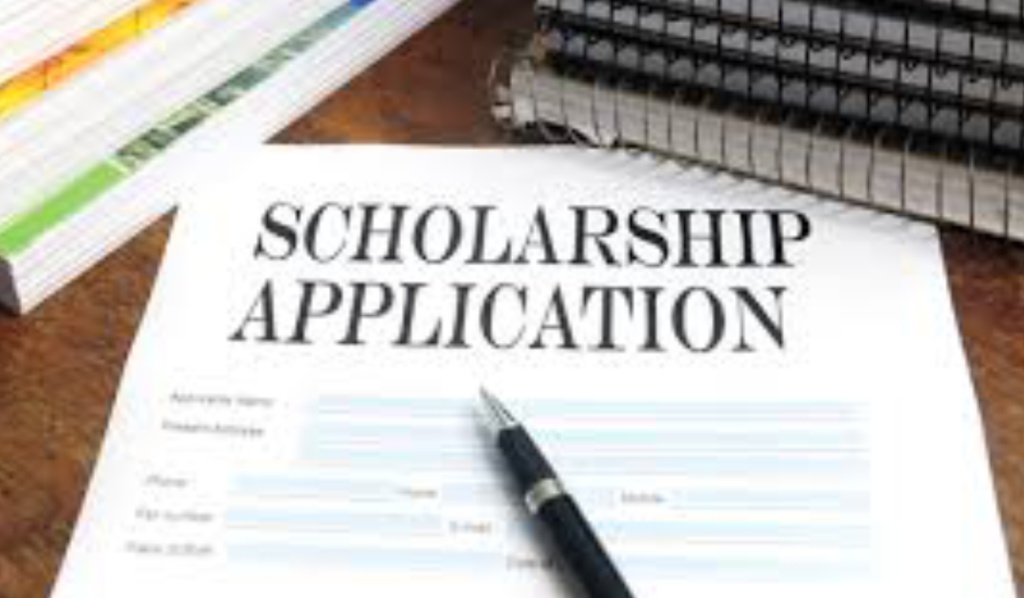 Scholarship application form with pen.