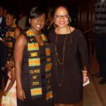 Two women at graduation ceremony, 2011.